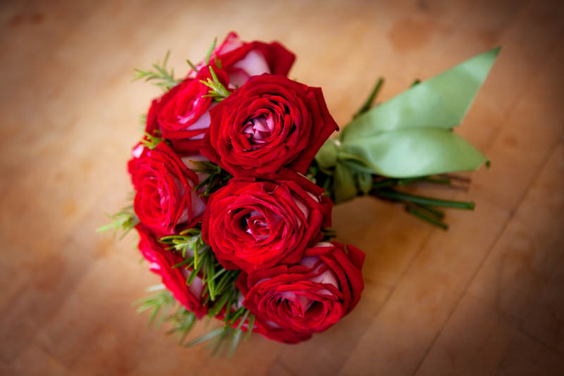 A beautiful bouquet of deep red roses looking from above