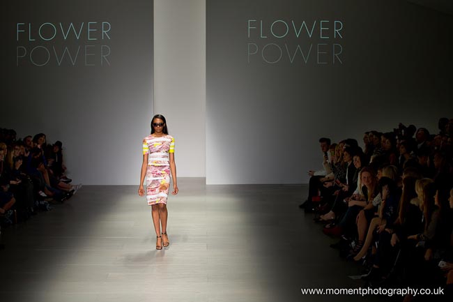 Wide shot of London Fashion Weekend catwalk model