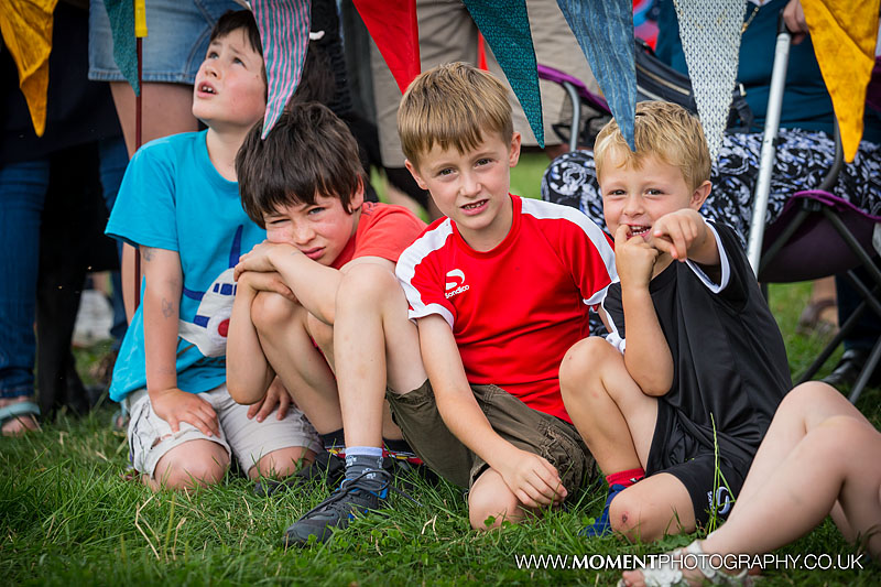 Young boys watching the ferret racing at The Lowland Games 2016