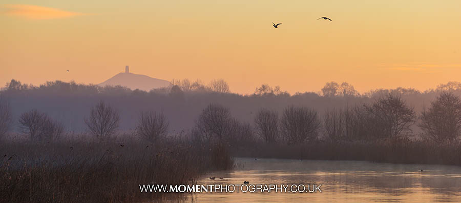 Orange sky over Glastonbury Tor