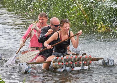 People raft racing at the Lowland Games in Thorney Somerset